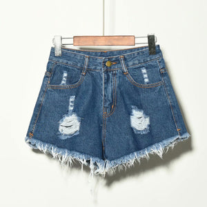 Dove shorts met gaten